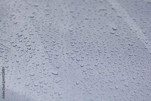 Droplets on the car surface.