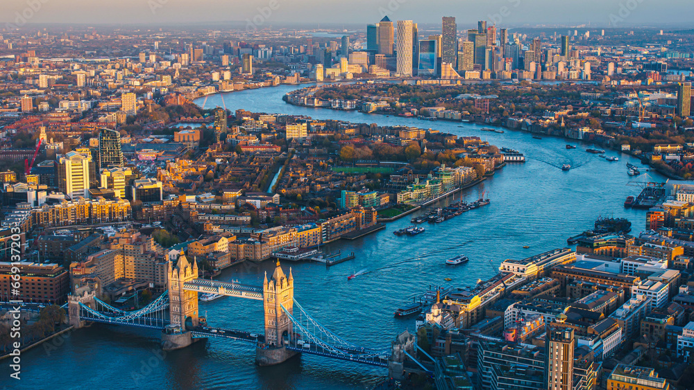 Aerial panoramic cityscape view of London and the River Thames, England, United Kingdom. Tower of London. anorama include river Thames, Tower bridge and City of London and Canary Wharf buildings.  - obrazy, fototapety, plakaty 