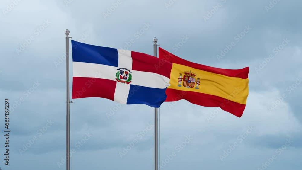 Spain and Dominican flag waving together on cloudy sky, endless seamless loop, two country cooperation concept Spain and Dominican flag waving together on cloudy sky, endless seamless loop, two country cooperation concept