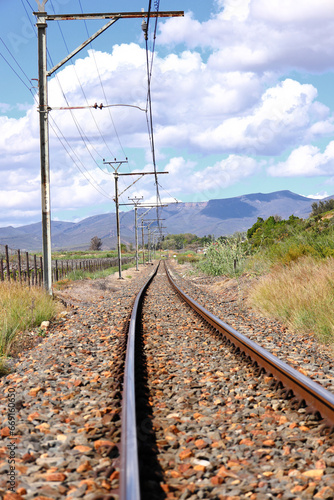 Fototapeta Naklejka Na Ścianę i Meble -  A picture of a railway line and overhead power lines