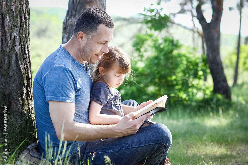 father and child reading the bible father and child reading the bible