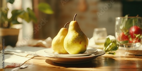 A simple yet elegant image of two pears sitting on a plate on a table. Perfect for food-related projects or still-life photography themes.