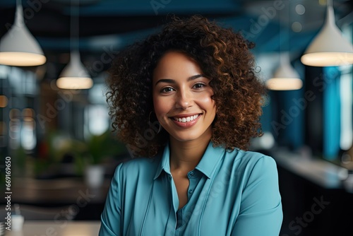 portrait of young african business woman smiling in the office
