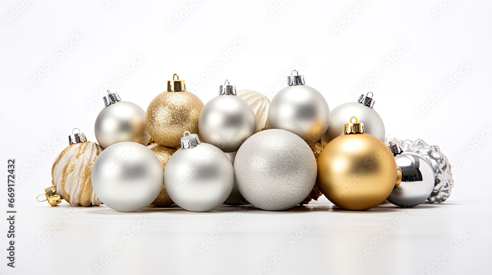 Silver and gold christmas decorations on a white background Silver and gold christmas decorations on a white background