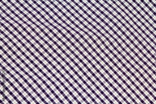 Old cotton fabric in black and white check