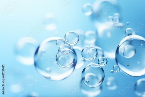 Close-up macro photo of water drops or oil bubbles on blue background. photo