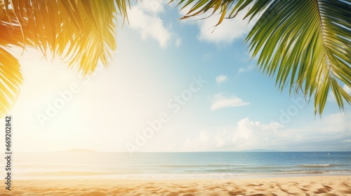 Beautiful wide panorama for summer vacation and travel. Golden sand of tropical beach, blurry palm leaves and sea on sunny day