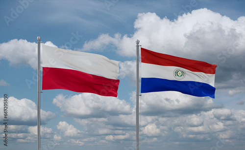Paraguay and Poland flags, country relationship concept