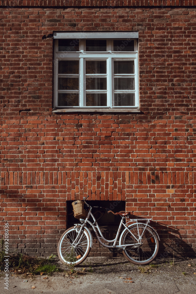 bicycle in front of wall