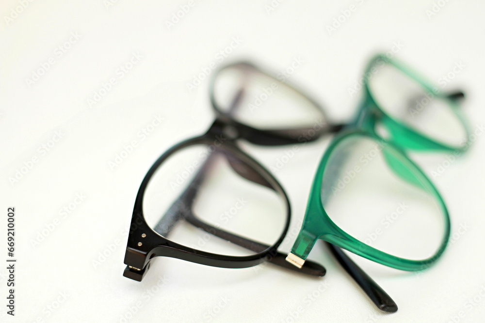 glasses on display on a table at an optician shop no people on white background stock image stock photo glasses on display on a table at an optician shop no people on white background stock image stock photo