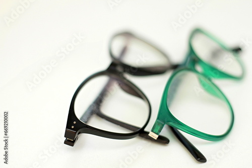 glasses on display on a table at an optician shop no people on white background stock image stock photo