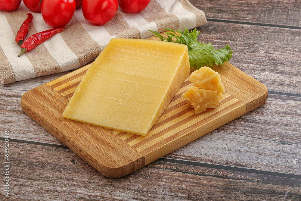 Parmesan hard cheese with small pieces Parmesan hard cheese with small pieces