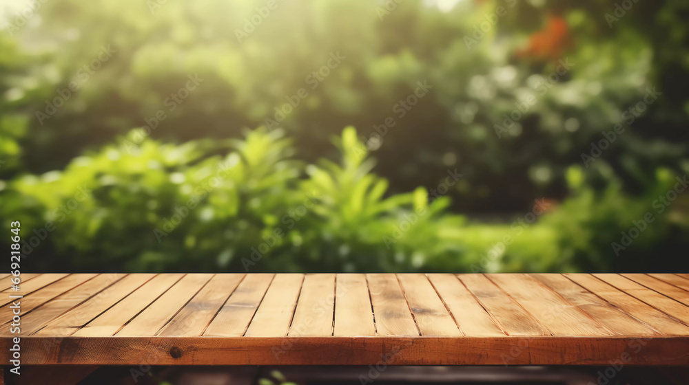 empty wooden table with blurry garden background empty wooden table with blurry garden background