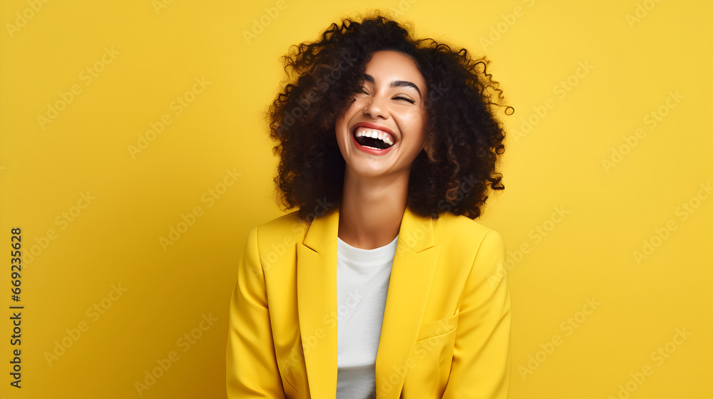 Happy business girl laughing, wearing bright clothes, Bright solid yellow background Happy business girl laughing, wearing bright clothes, Bright solid yellow background