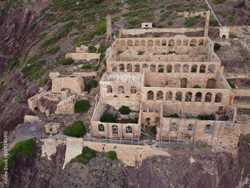 Vista aerea dei resti della Laveria Lamarmora, miniera di Nebida, sugli scogli del mare di Iglesias, Sud Sardegna photo