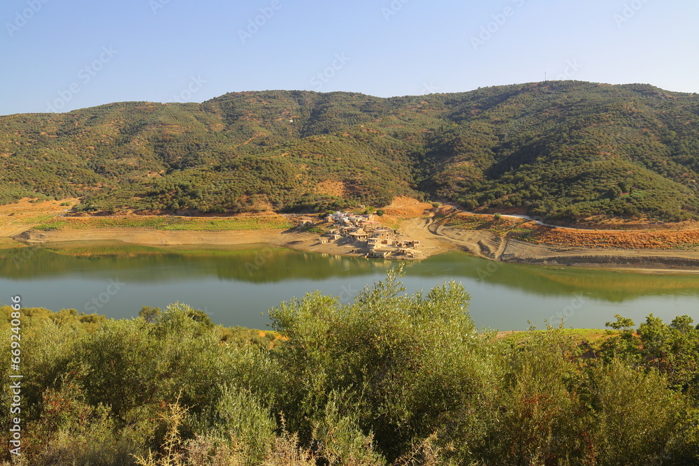 Aposelemis reservoir and the village of sfendylion showing the low water level, Crete, Greece, Europe.