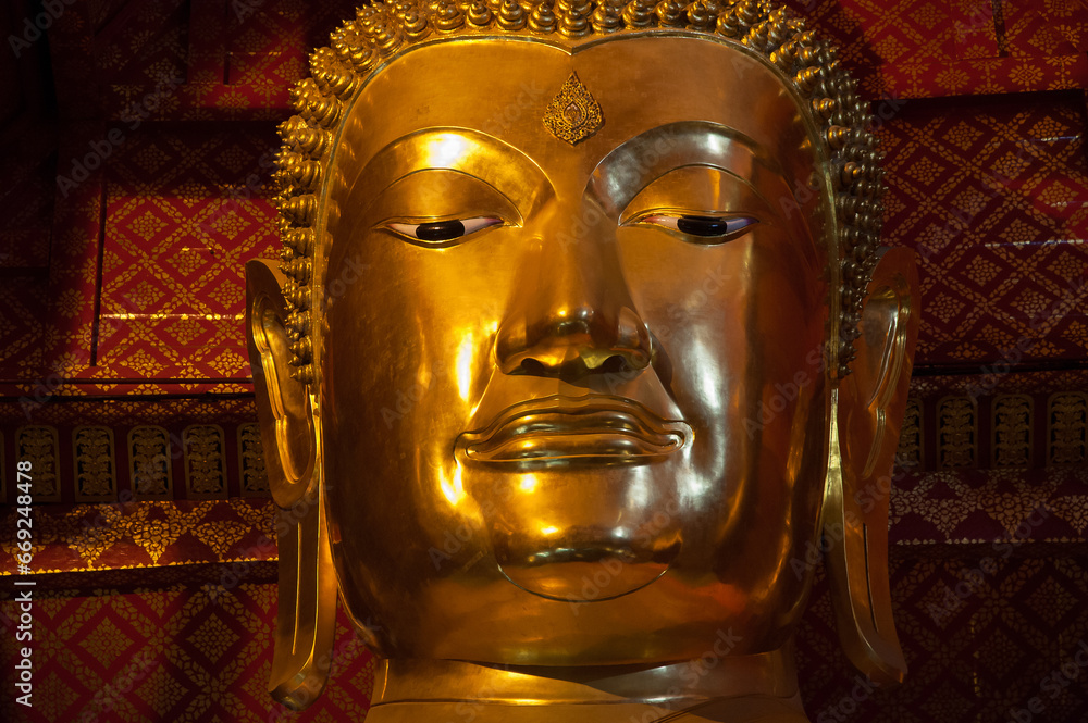 Close of the huge buddha image of Wat Phanan Choeng Worawihan