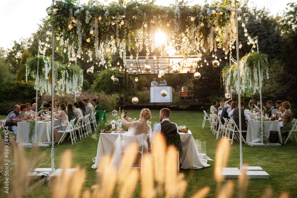 evening wedding family dinner in the forest