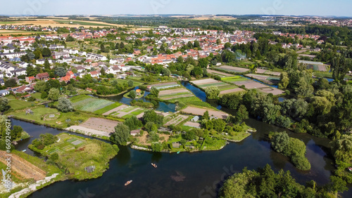 Aerial view of the Hortillonnages of Amiens made of several islands covered with gardens sheds and plantations in a swampy area of the river Somme in Picardie, France