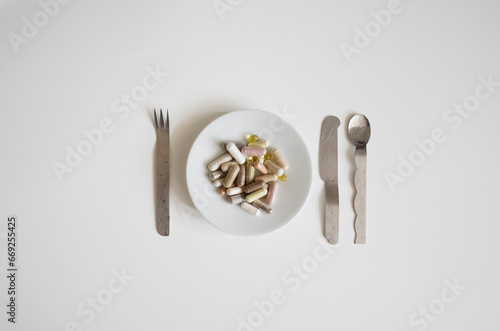 pills on the plate photo