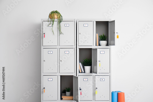 Modern locker with books an...