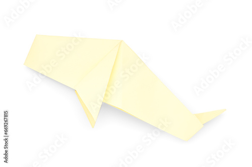 Yellow origami whale on whi...