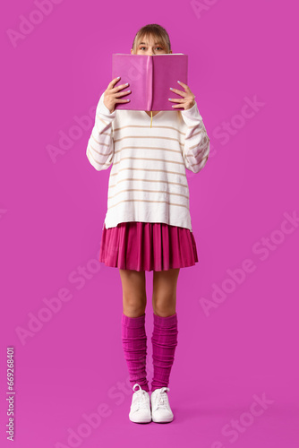 Young woman dressed as doll...