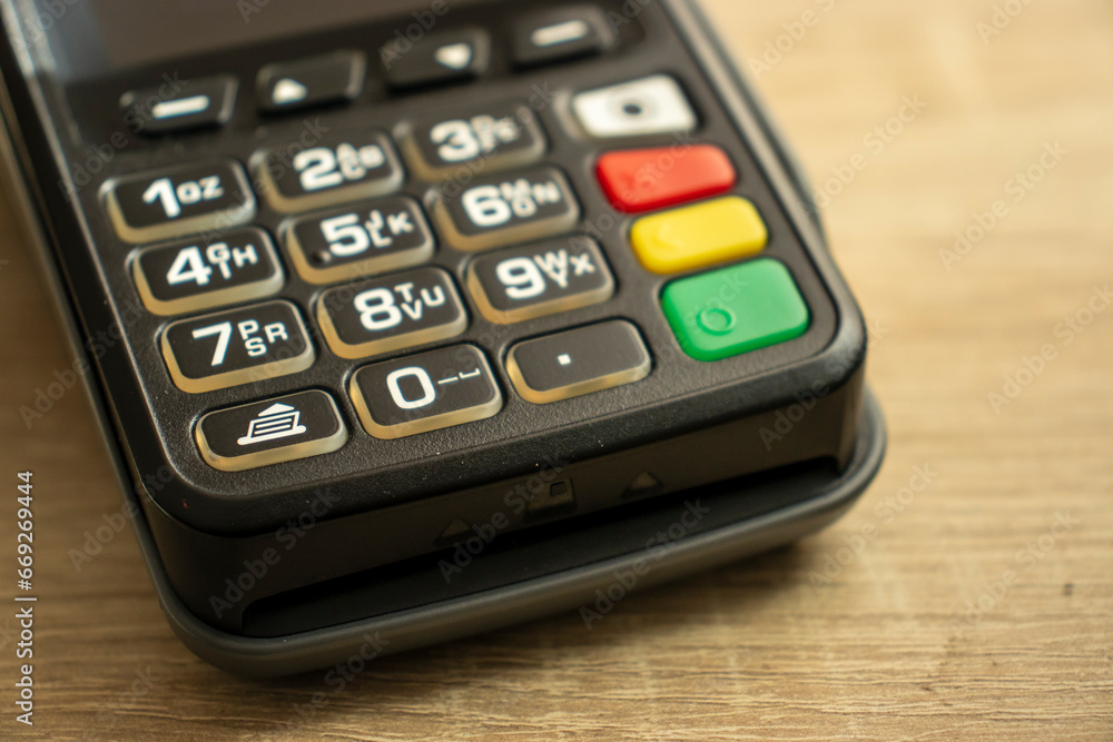 Closeup of a payment terminal keyboard in a banking concept. Closeup of a payment terminal keyboard in a banking concept.