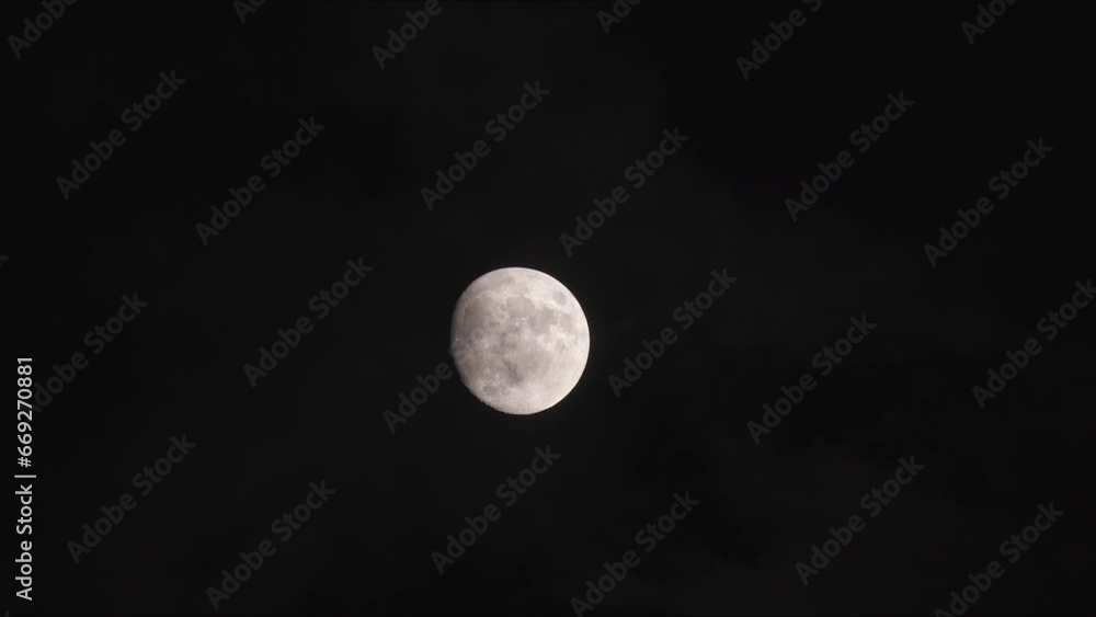 Full Moon With Clouds At Night In Mysterious Sky Footage. Full Moon With Clouds At Night In Mysterious Sky Footage.