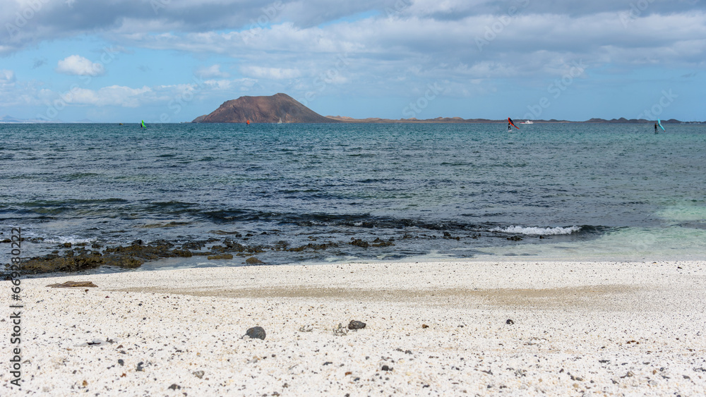 Popcorn beach in Corralejo on Fuerteventura with Lobos island Popcorn beach in Corralejo on Fuerteventura with Lobos island