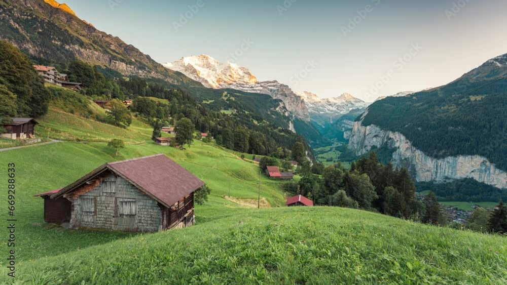 View from Wengen mountain village and Lauterbrunnen valley with Jungfrau mountain in the evening at Bern, Switzerland View from Wengen mountain village and Lauterbrunnen valley with Jungfrau mountain in the evening at Bern, Switzerland