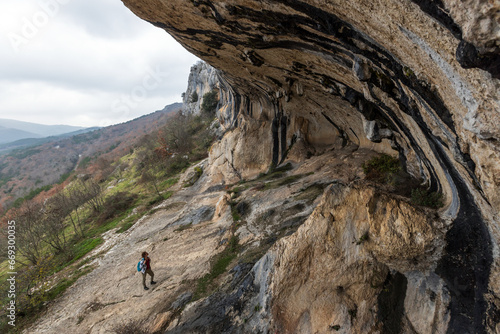 Woman Tourist Discover natural Wonder of Slovenia the Ears of Istra - Geological Karst Formation 