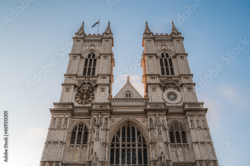 Main facade of Westminster Abbey against blue sky , Gothic style, in London, England, United Kingdom