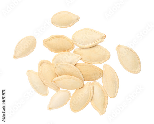 Dry pumpkin seeds isolated on white  top view