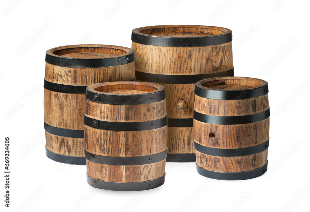 Set of many wooden barrels on white background Set of many wooden barrels on white background