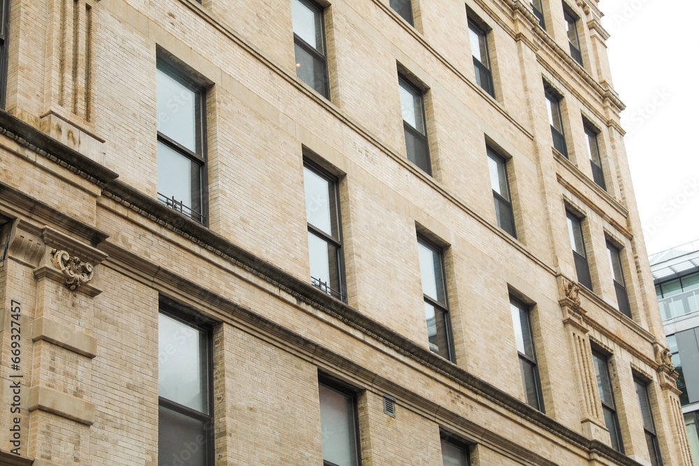 Naklejka premium urban commerce, this vibrant stock image captures the essence of thriving commercial real estate through a striking portrayal of brick buildings