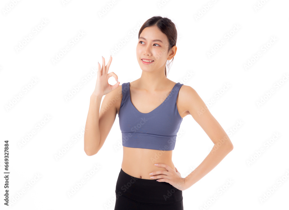 Portrait of beautiful young asian woman in sportswear gesture success isolated on white background, sport and exercise for health, training and strength, female slimming with confident. Portrait of beautiful young asian woman in sportswear gesture success isolated on white background, sport and exercise for health, training and strength, female slimming with confident.