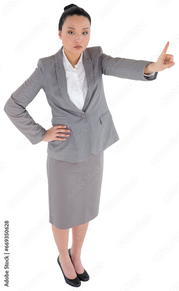 Digital png photo of serious asian businessman pointing finger on transparent background Digital png photo of serious asian businessman pointing finger on transparent background