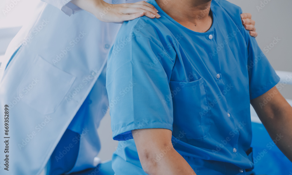 Fototapeta premium Physiotherapist working with patient in clinic, closeup
