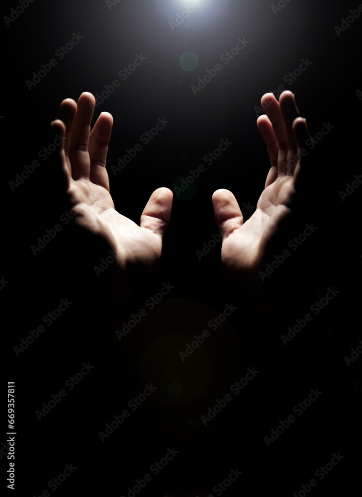 Hands, prayer and help from God with praise, closeup of holy person with gratitude and respect for religion. Guide, wellness and praying, worship and faith with hope and trust on dark background - obrazy, fototapety, plakaty 