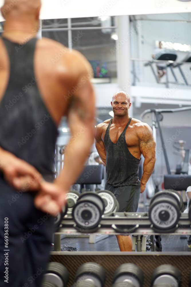 Man, arm flexing and mirror at gym with fitness, workout and exercise of bodybuilder with reflection. Muscle, male person and athlete with sport training, wellness and body builder at a health club Man, arm flexing and mirror at gym with fitness, workout and exercise of bodybuilder with reflection. Muscle, male person and athlete with sport training, wellness and body builder at a health club
