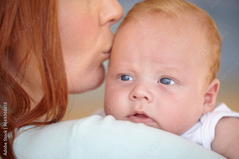 Kiss, baby and portrait of newborn with mother in home bonding together with affection. Calm, face and mom carrying infant child in arms to relax in house with love, care and support with mommy Kiss, baby and portrait of newborn with mother in home bonding together with affection. Calm, face and mom carrying infant child in arms to relax in house with love, care and support with mommy