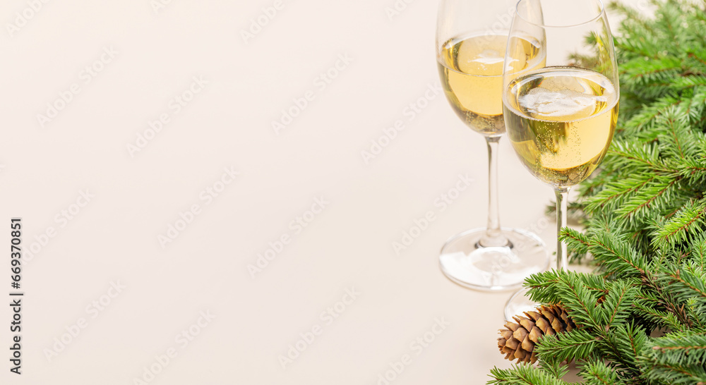 Xmas fir tree branch, champagne and space Xmas fir tree branch, champagne and space