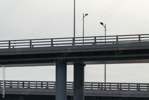 silhouette of road lamps on the bridge