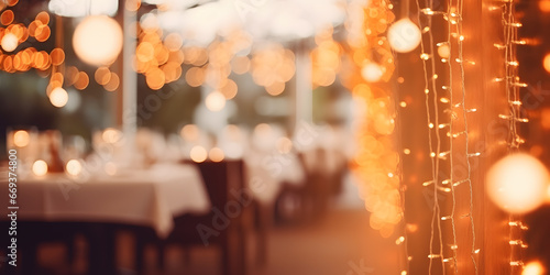 Blurred background of restaurant with abstract bokeh light. Lights decoration Party Event Festival Holiday blur background