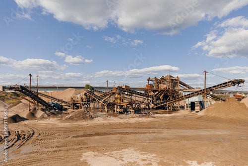 Sand quarry banner, Industrial plant with belt conveyor in open pit mining. Construction site, Industry machine for stone crusher
