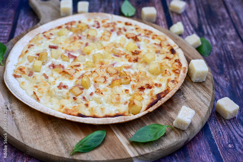 Italian roman style cheese pizza with parmesan cheese, ham, mushrooms and tomato sauce Italian roman style cheese pizza with parmesan cheese, ham, mushrooms and tomato sauce