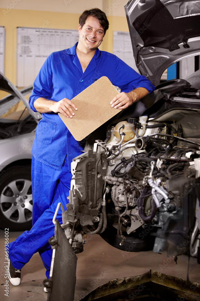 Portrait, happy man and technician with checklist on engine of car, repair or maintenance. Smile, mechanic and person with clipboard on motor hood, auto service and workshop, garage or small business