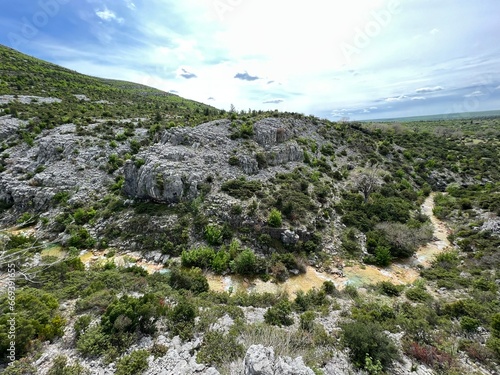 The river Bijela voda or Bijeli Stream in a rugged canyon at the foot of the Przun hill, Karin Gornji - Croatia (Rijeka Bijela voda ili Bijeli potok u krševitom kanjonu podno brda Pržun - Hrvatska)
