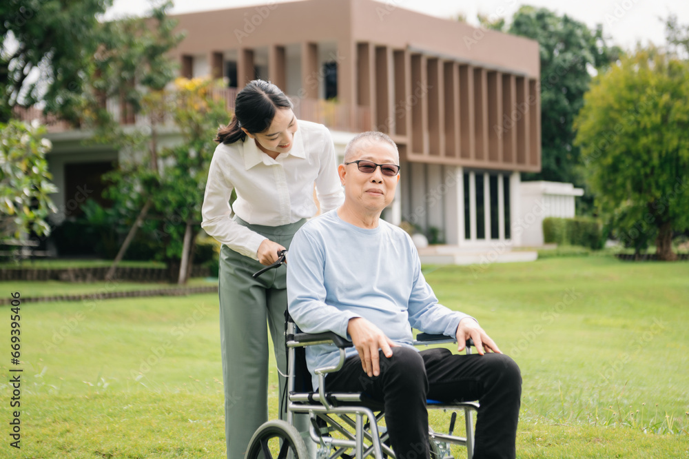 Happy adult granddaughter and senior grandfather having fun enjoying talk while relaxing sitting outdoor in park.. Happy adult granddaughter and senior grandfather having fun enjoying talk while relaxing sitting outdoor in park..
